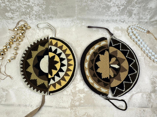 Two decorative circular items with geometric patterns on a textured surface.